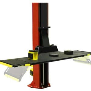 Red single-post car lift with platform