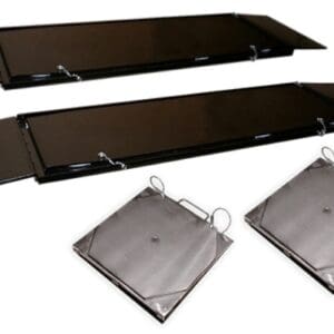 Black folding loading ramps with anchor plates